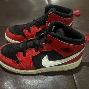 Kids Red and Black Nike Sneakers